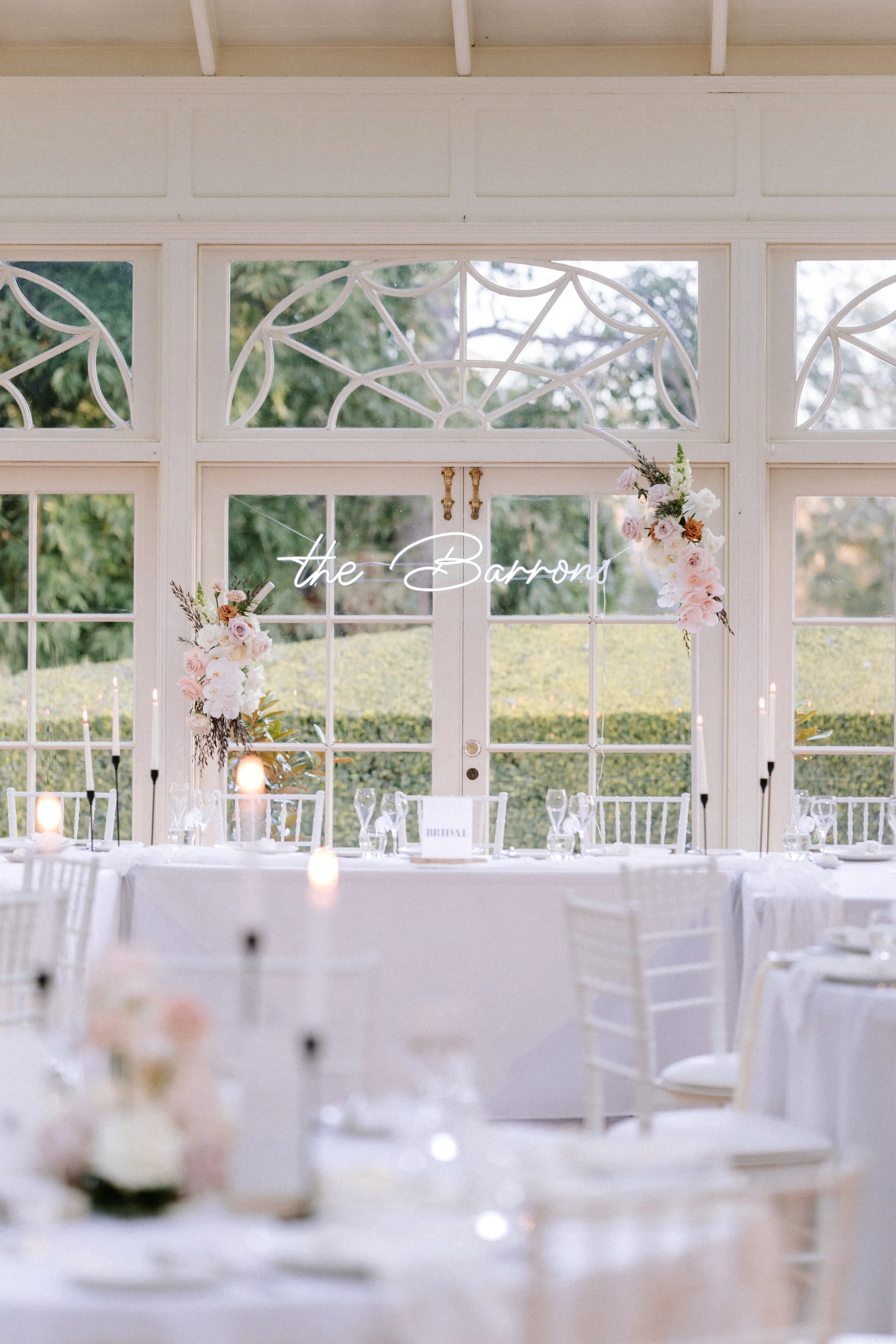 Wedding flowers and neon signs
