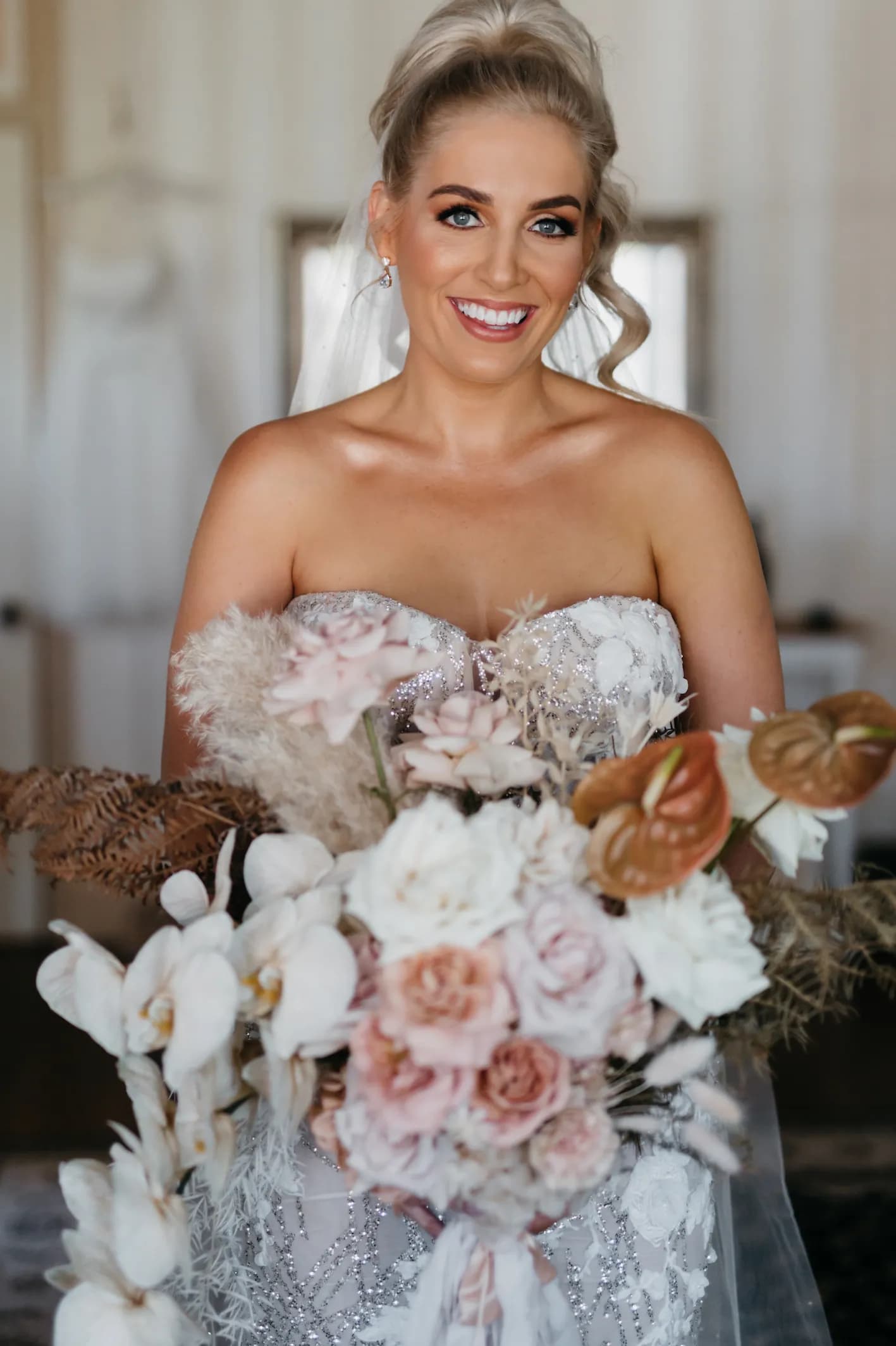 Bride holding flowers