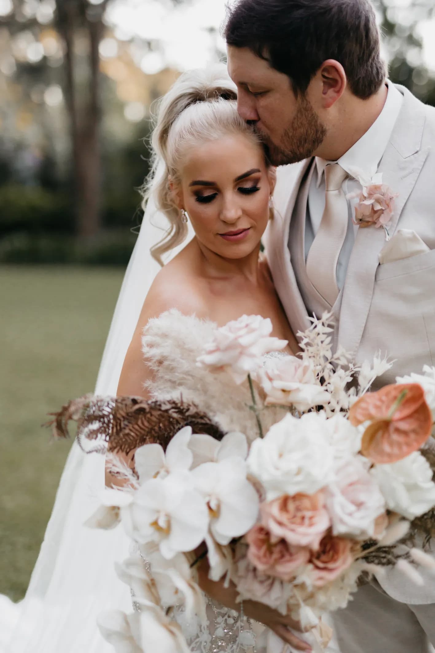Bride and groom kissing