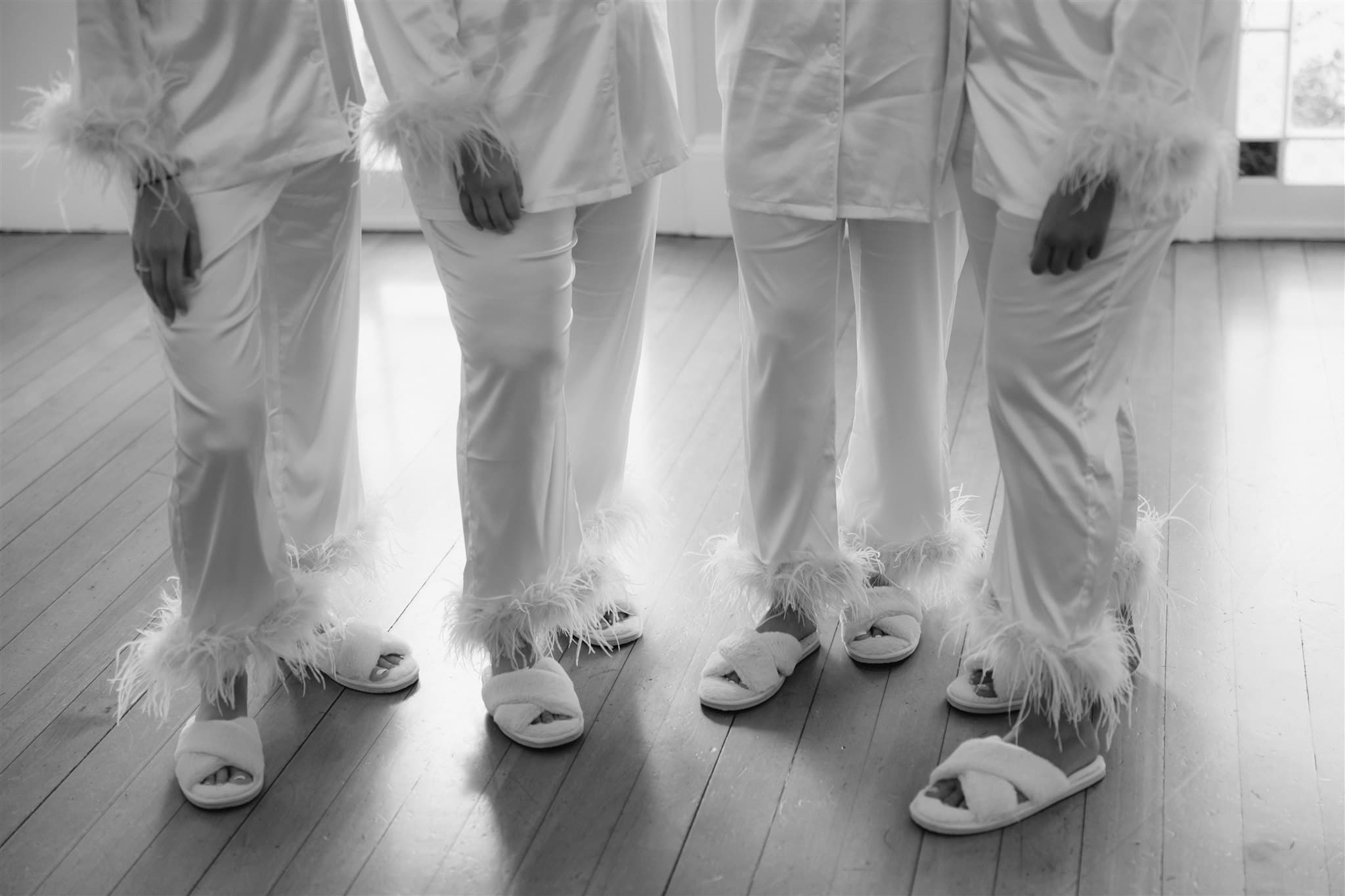 Bride and bridesmaids wearing slippers