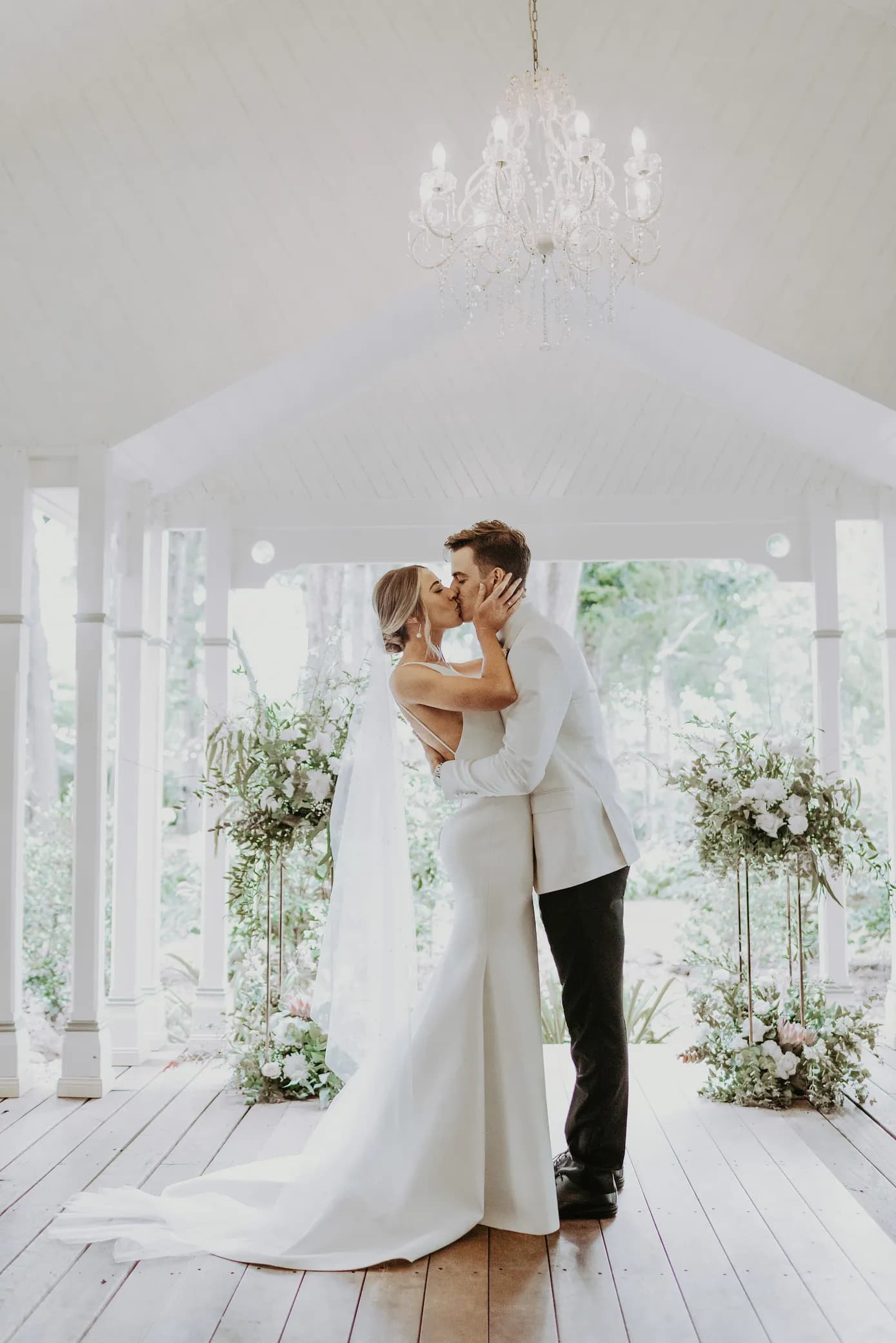 Bride and groom kissing