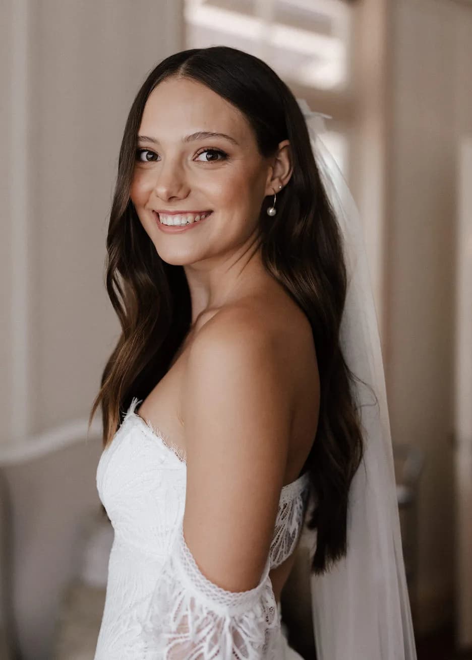 Bride smiling and looking at camera