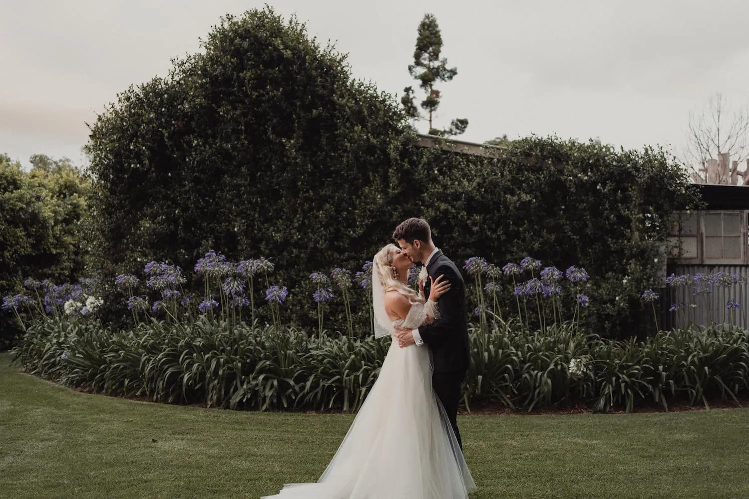 Bride and groom in gardens