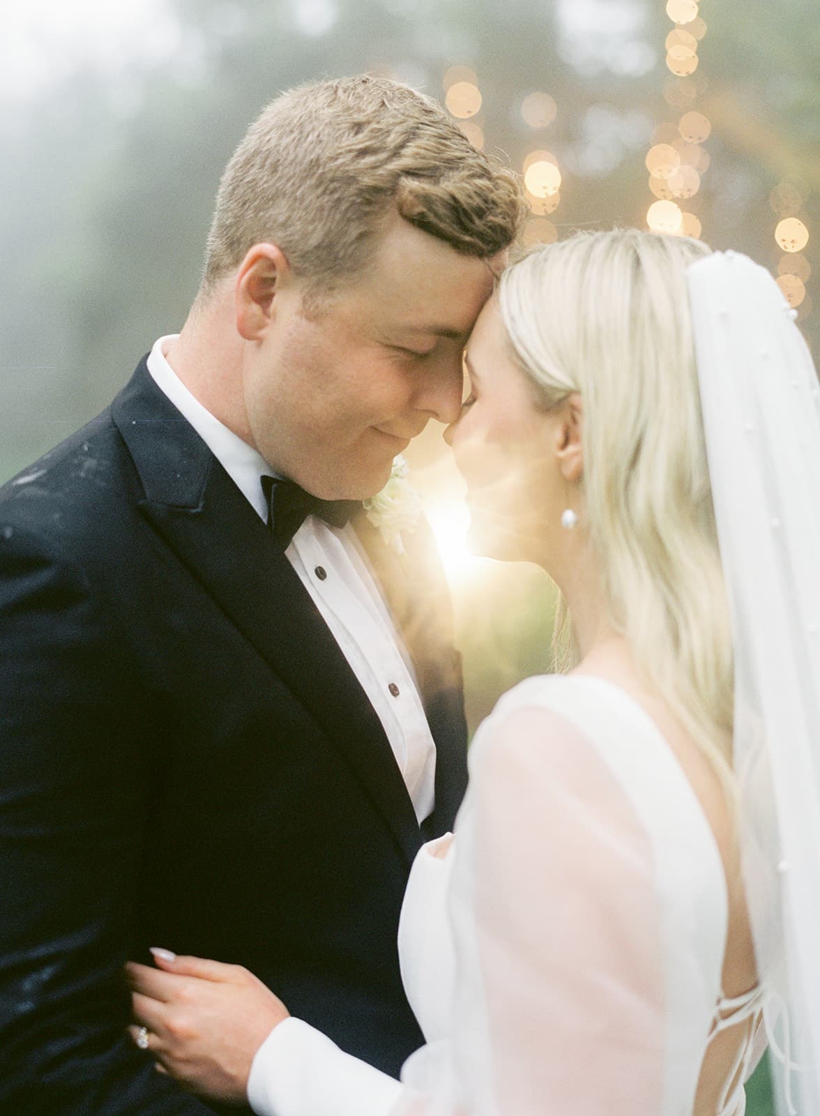 Bride and groom embracing