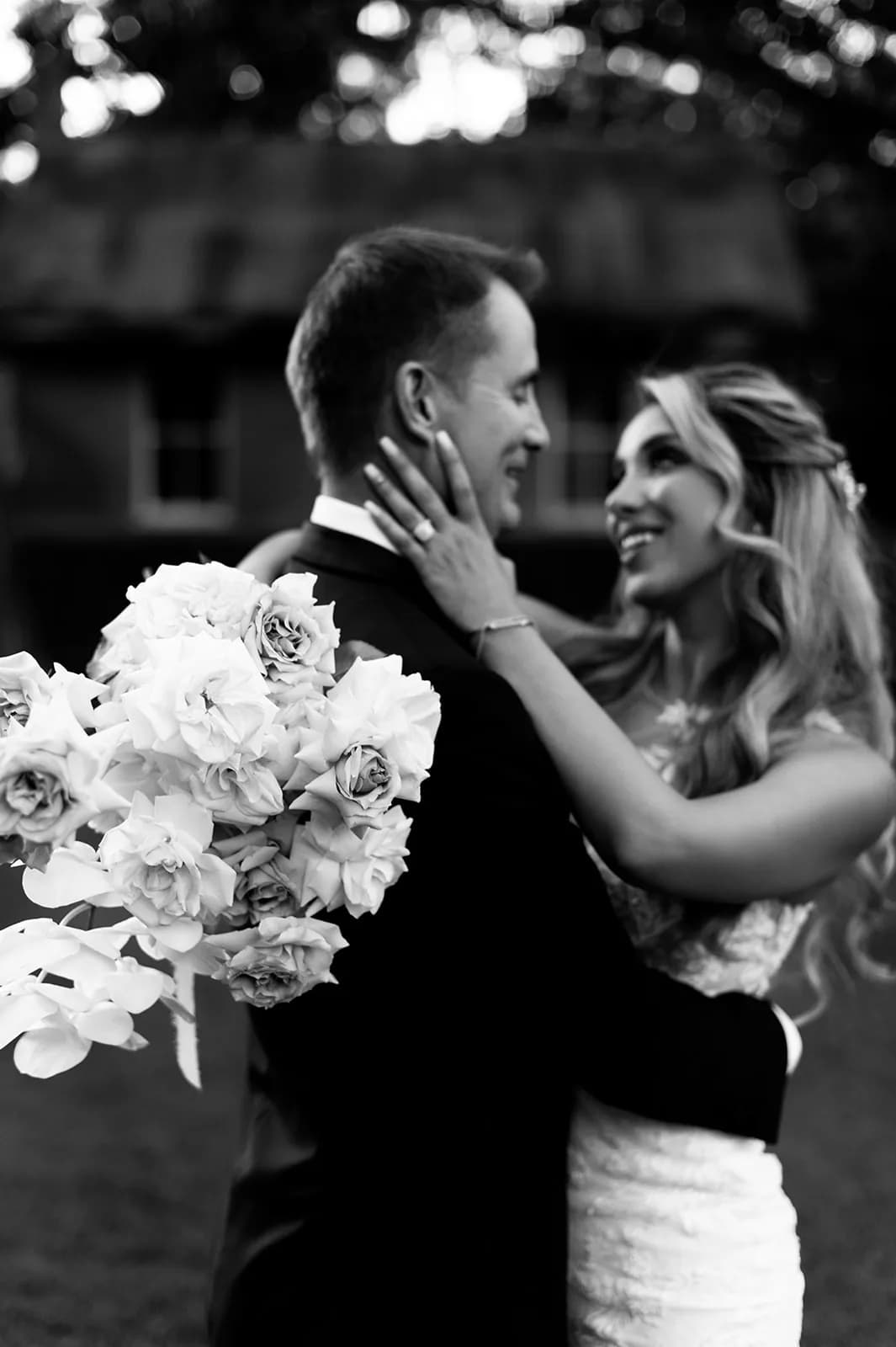 Bride and groom embracing
