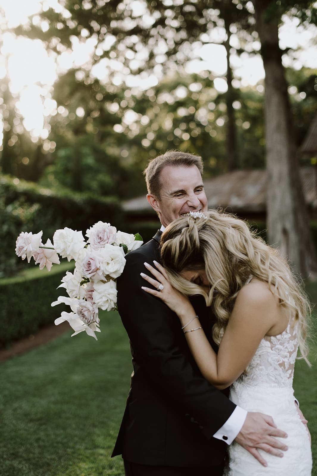 Groom and bride laughing