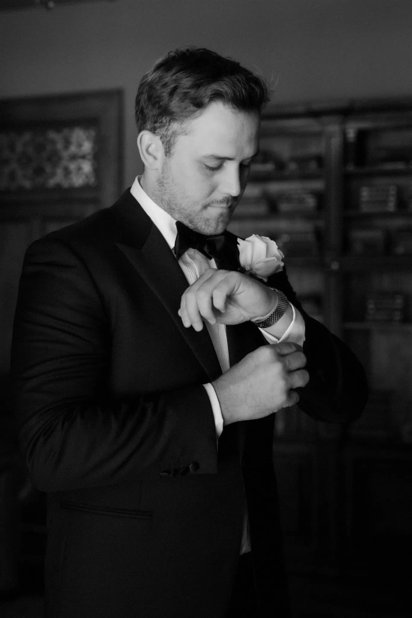 Groom doing up cufflinks