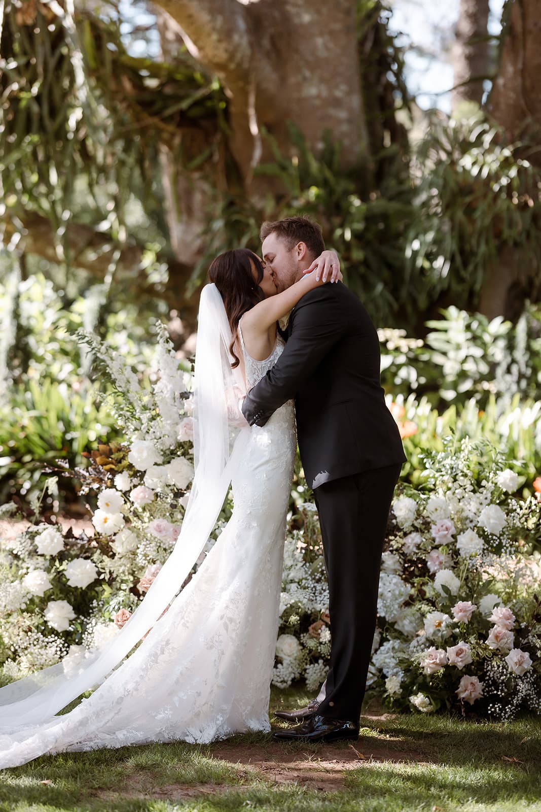 Bride and groom kissing