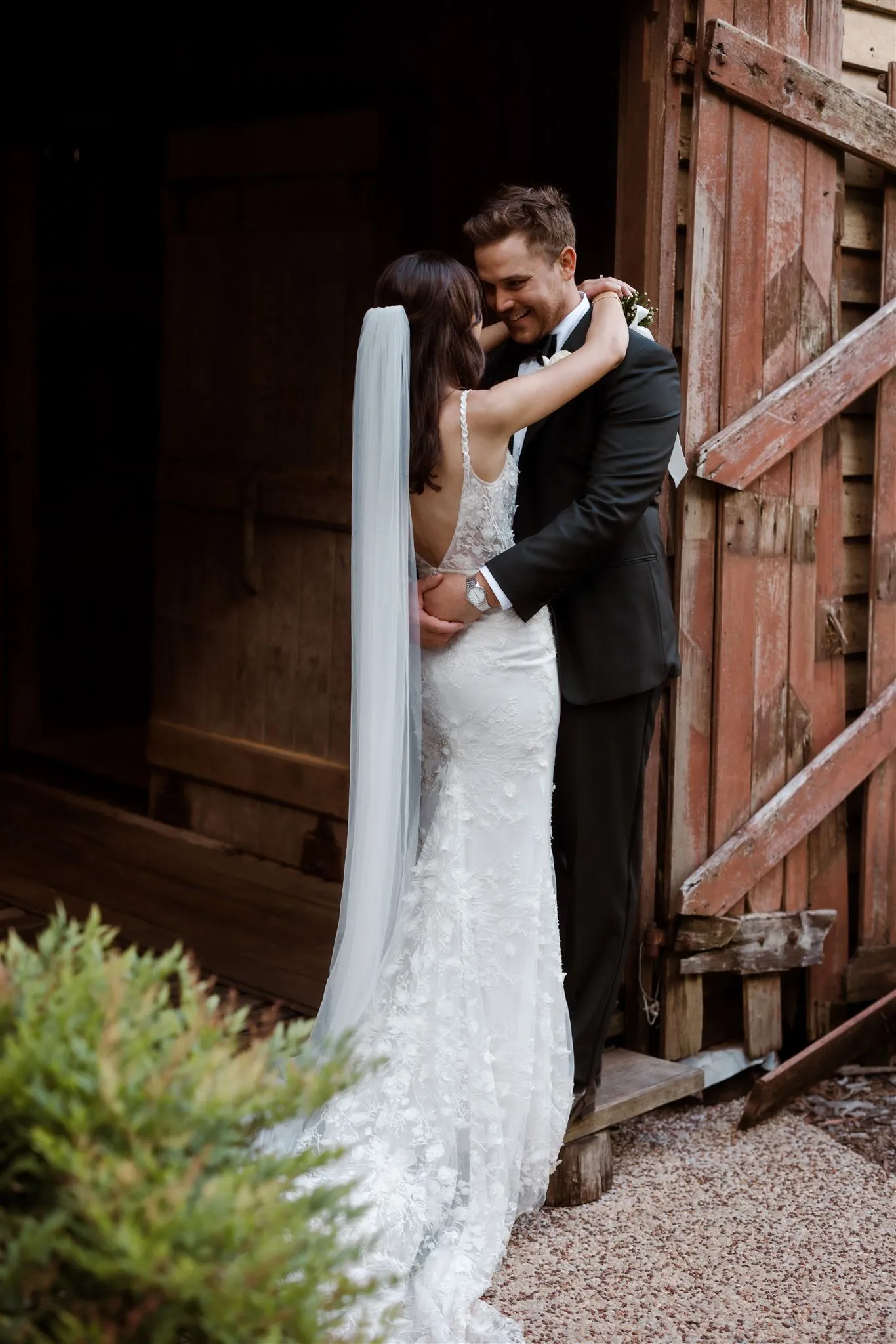 Bride and groom embracing