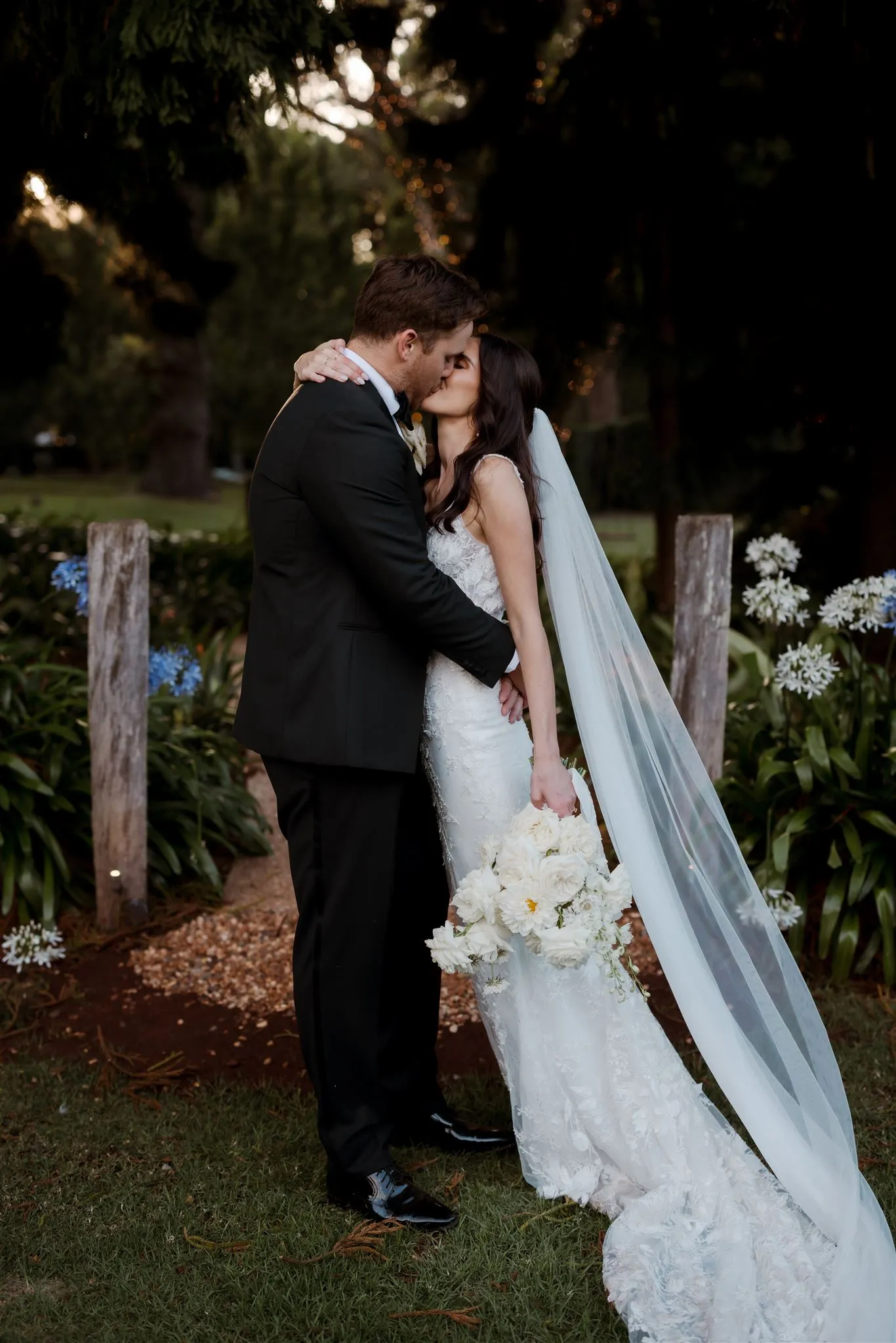 Bride and groom kissing