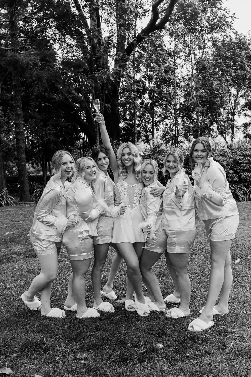 Bride and bridesmaids with champagne