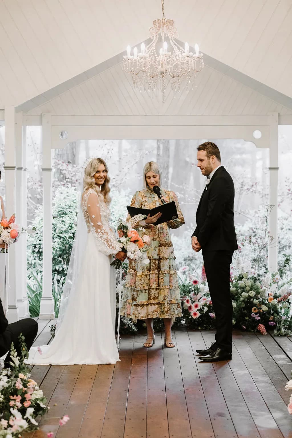 Bride and groom standing at aisle