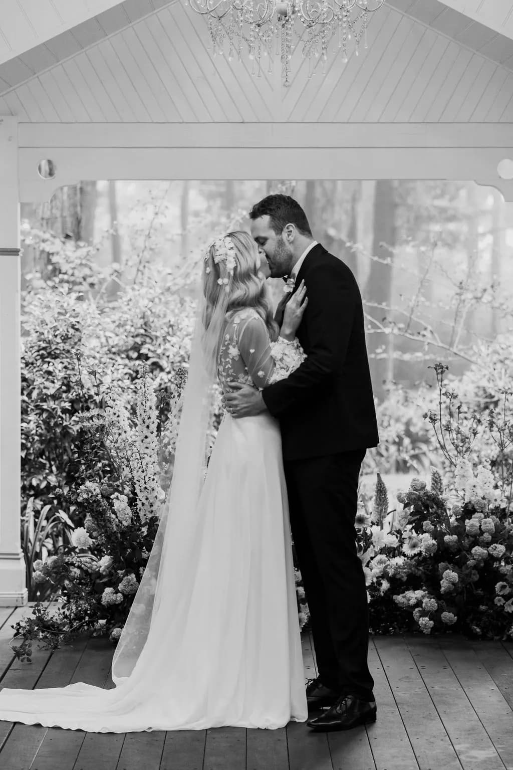 Bride and groom kissing