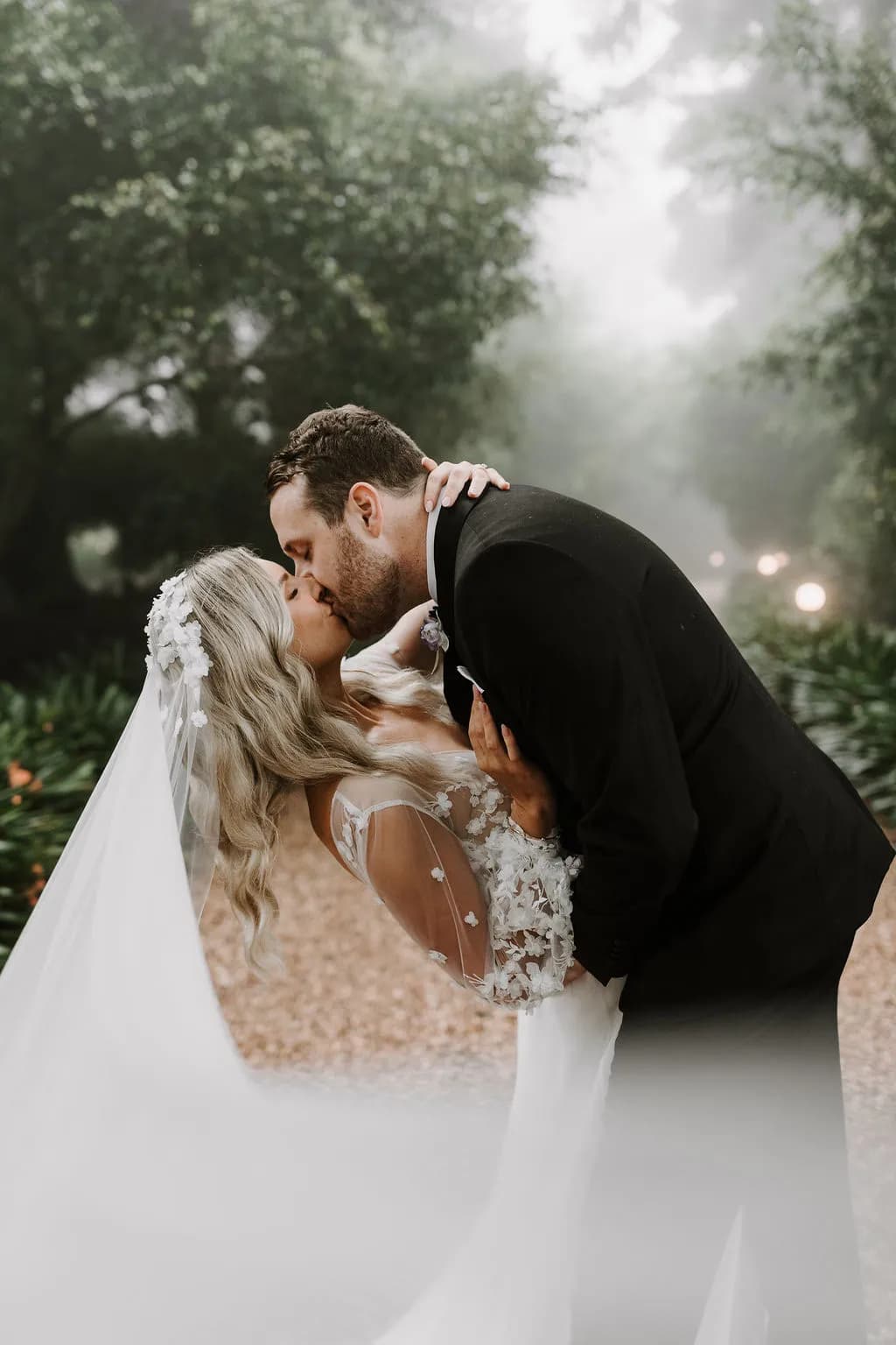Bride and groom kissing