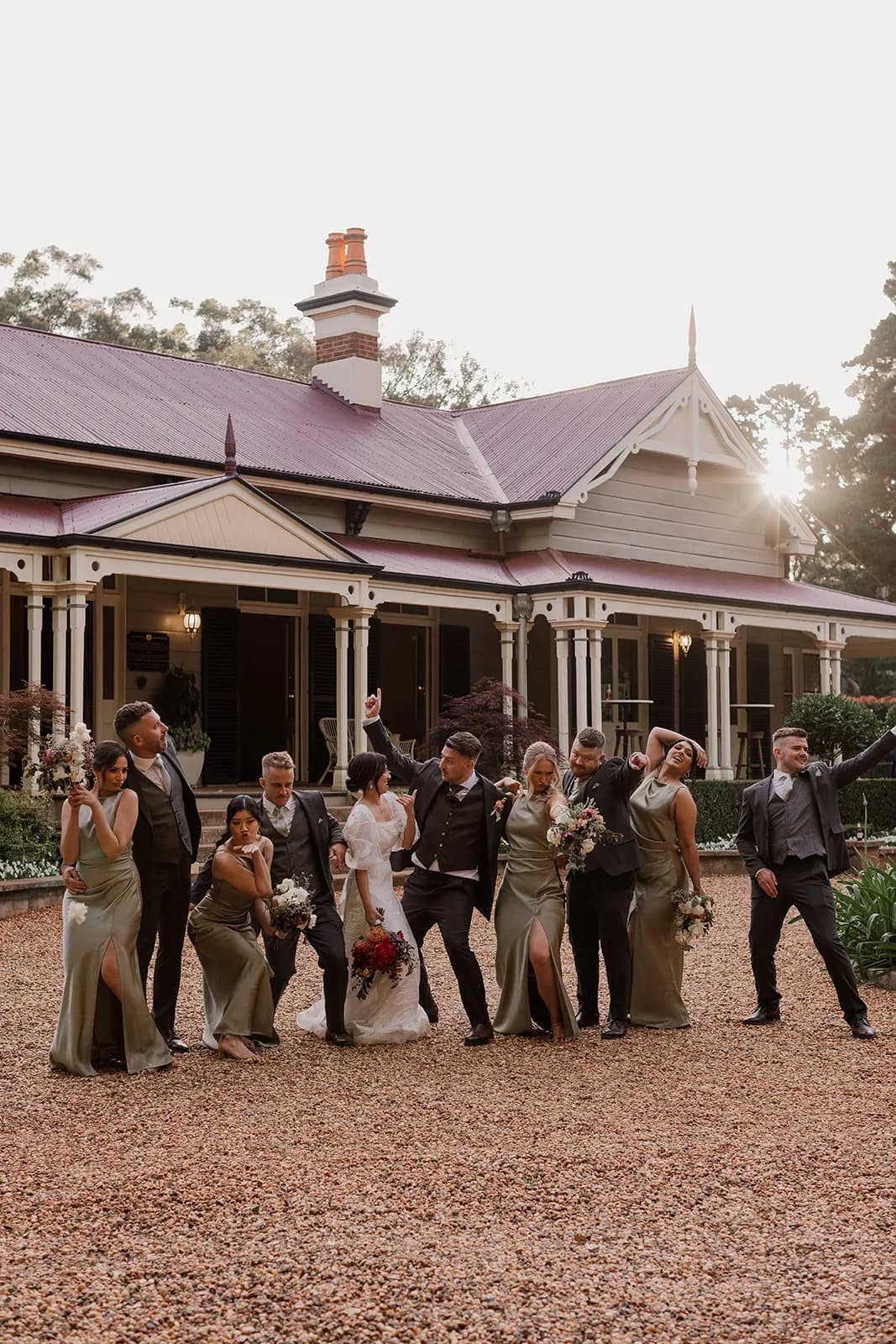 Wedding party dancing on driveway