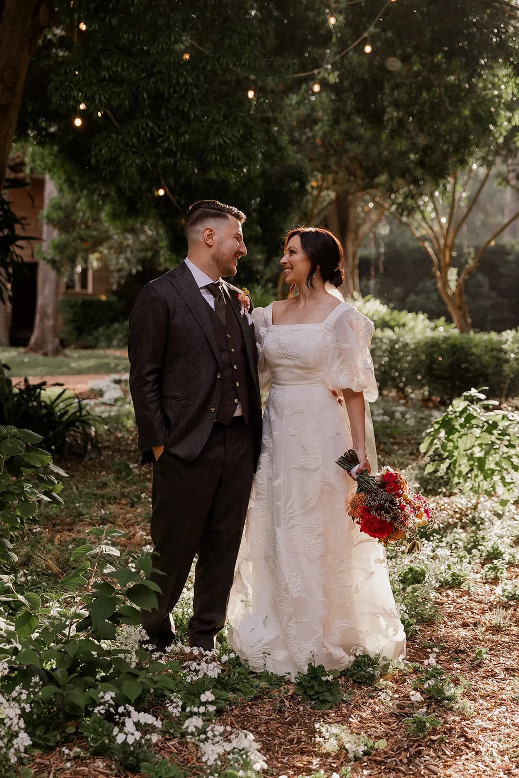 Bride and groom in gardens