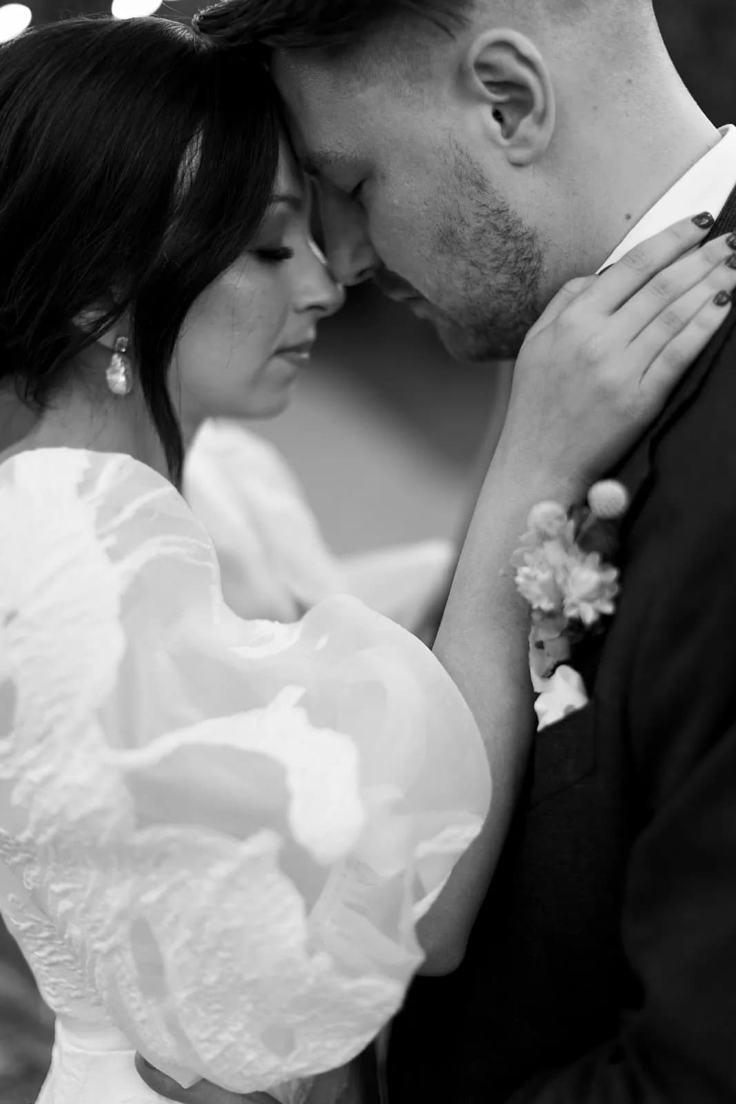 Bride and groom hugging