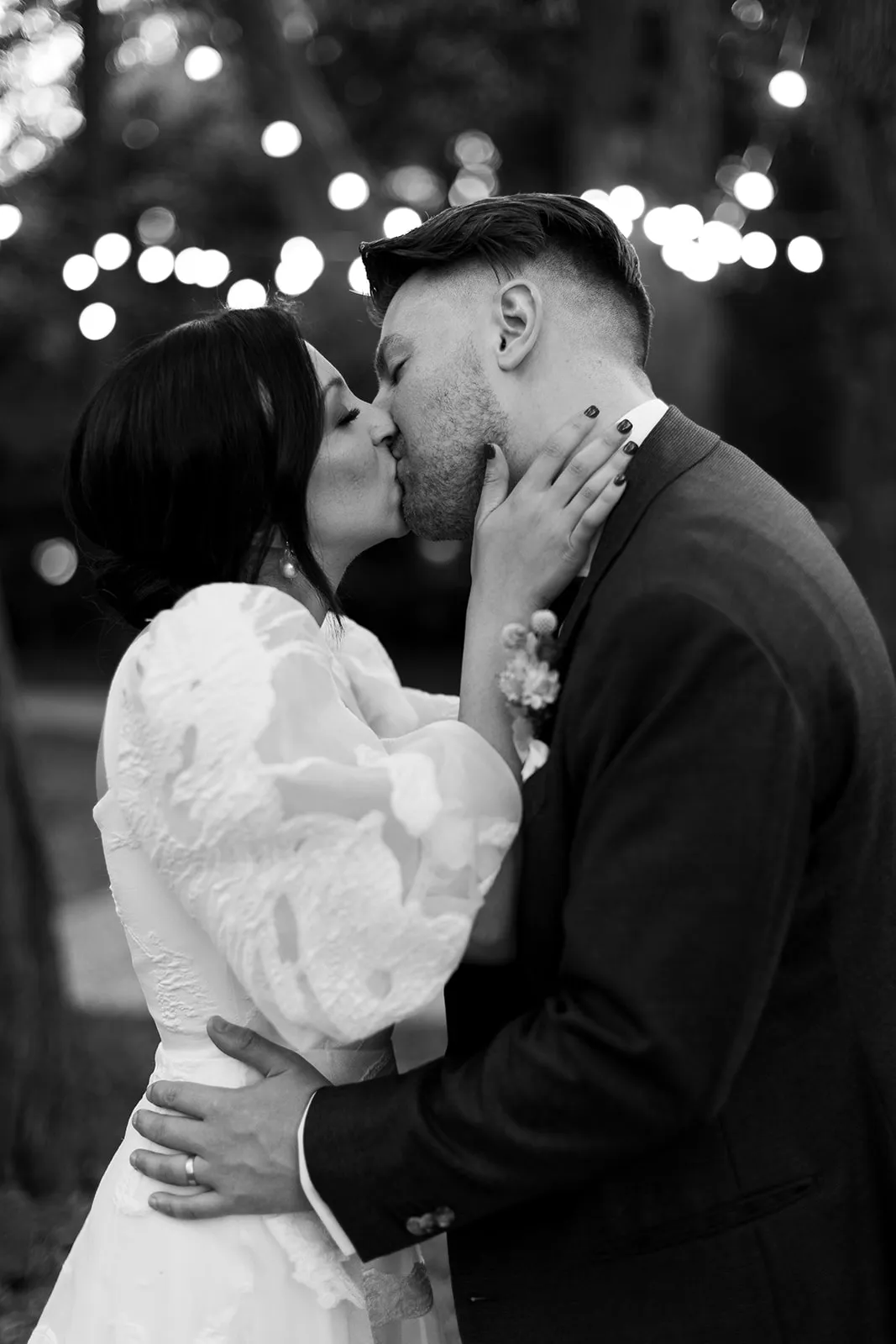 Bride and groom kissing