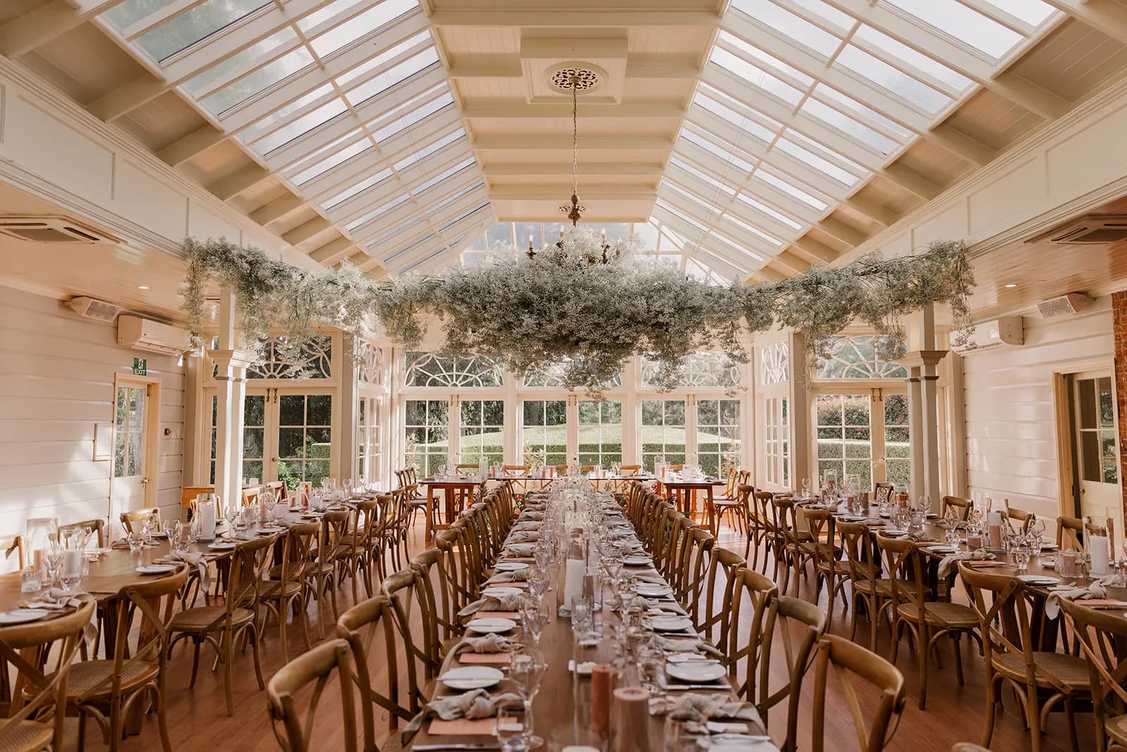 Wedding reception with hanging floral arrangement