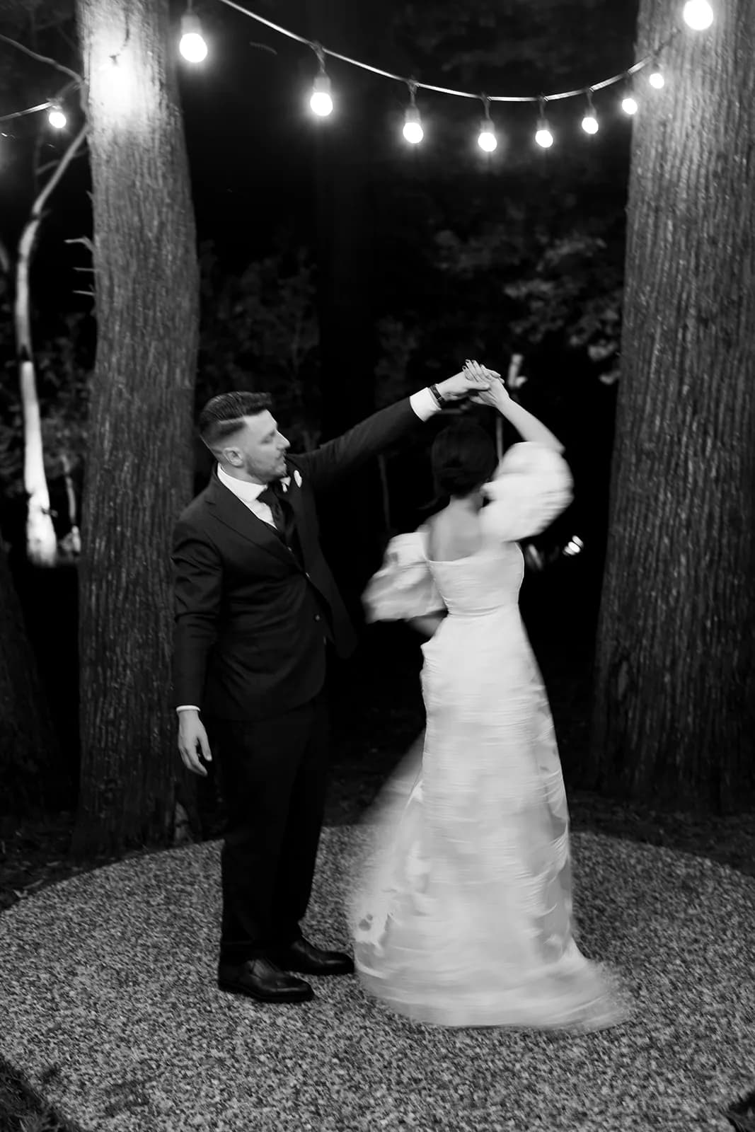 Bride and groom dancing in The Woods