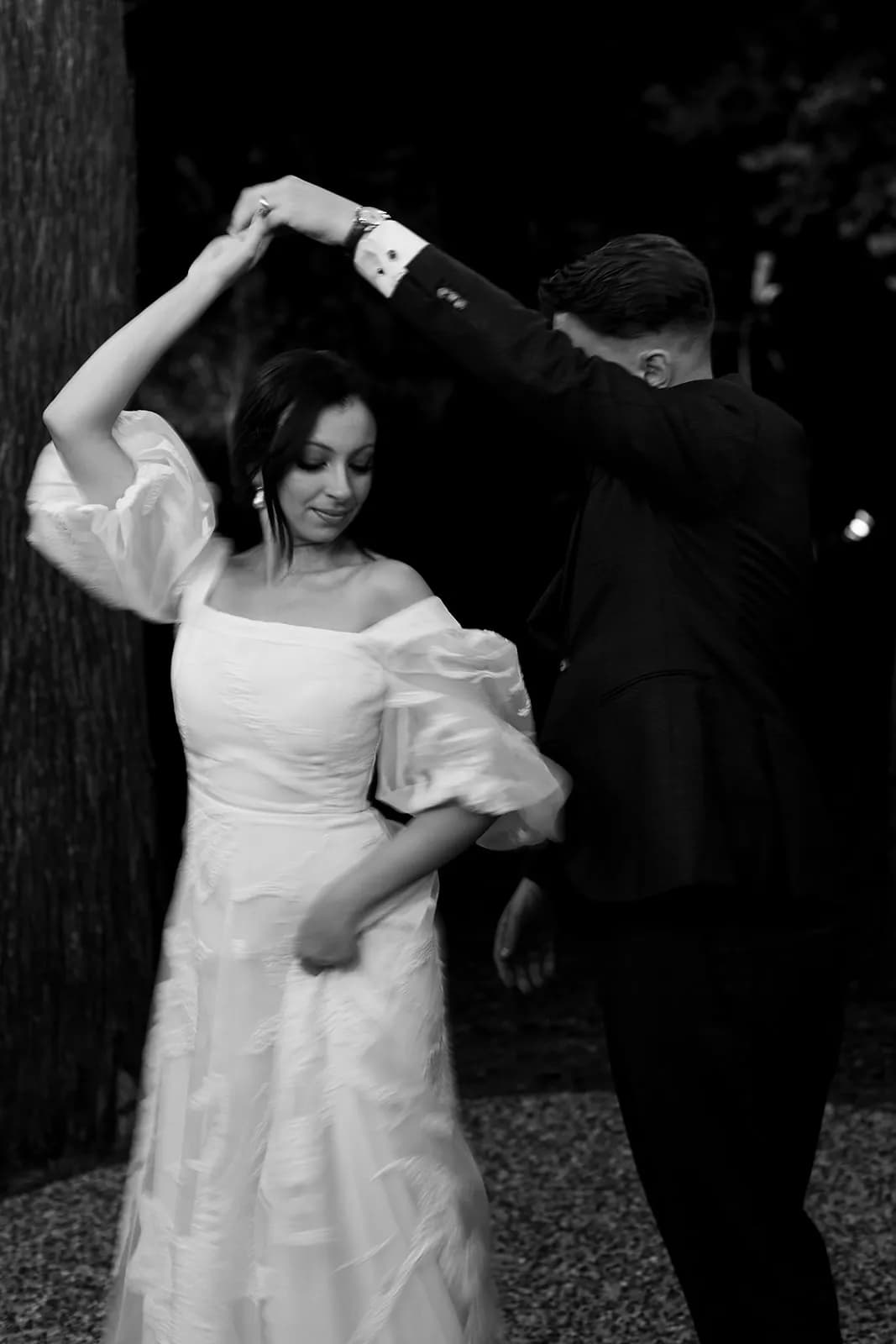 Bride and groom dancing in The Woods
