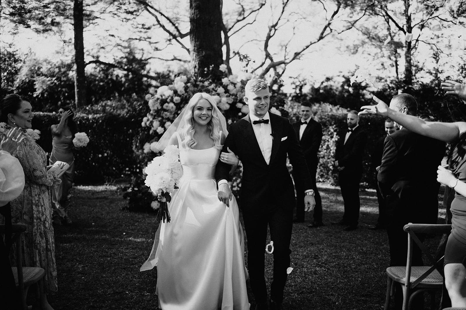 Bride and groom walking back down the aisle