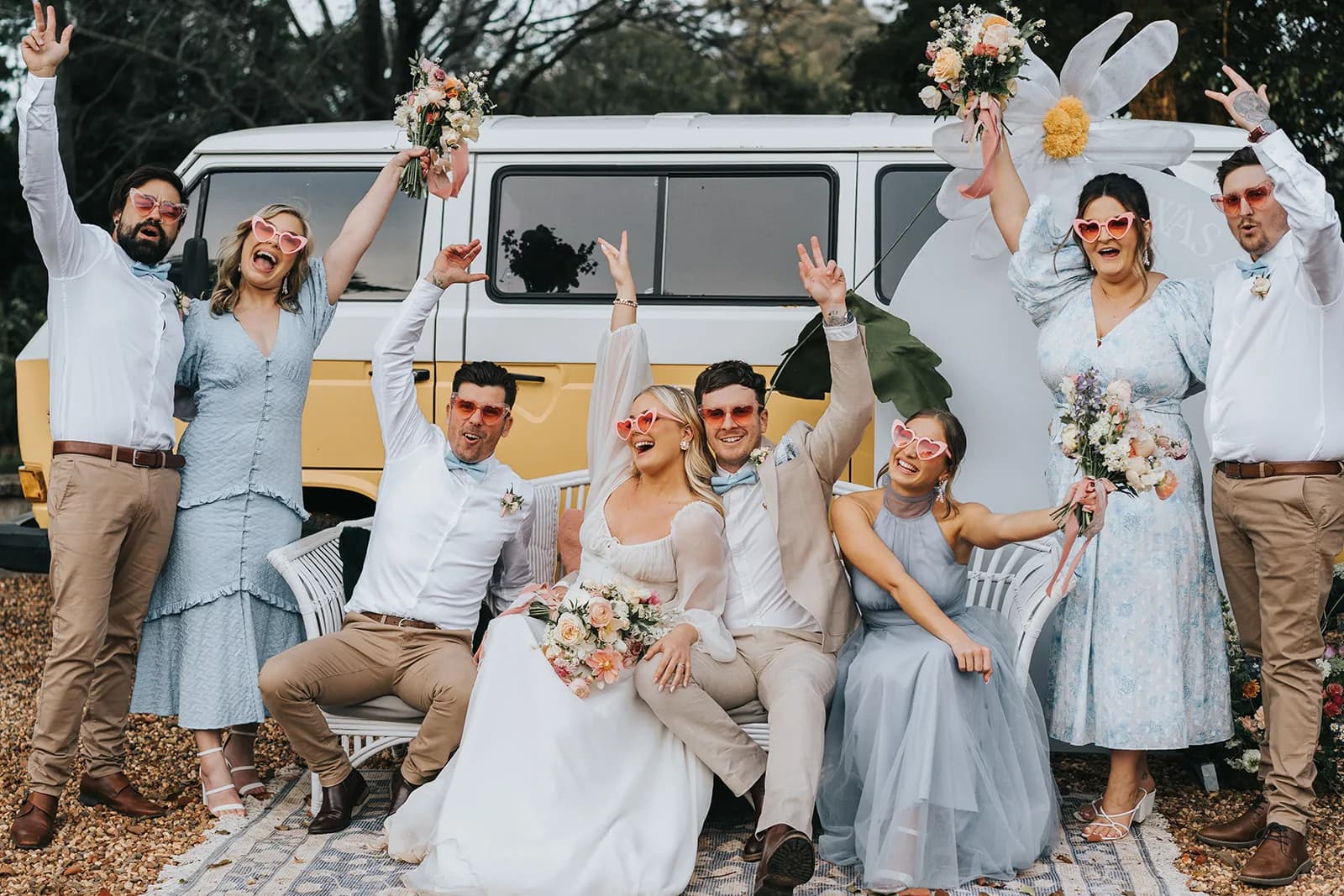 Wedding party in front of kombi van