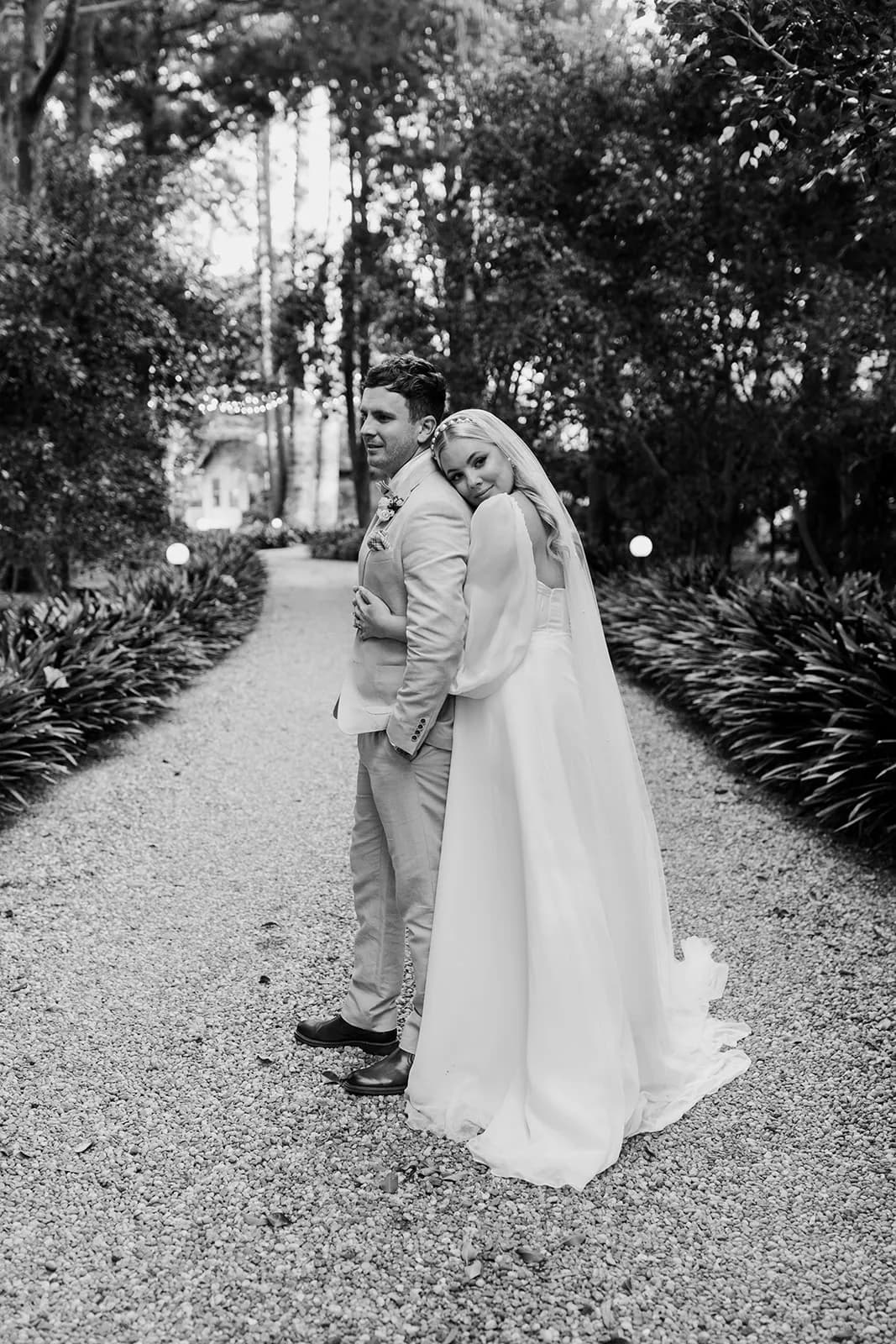 Bride and groom hugging
