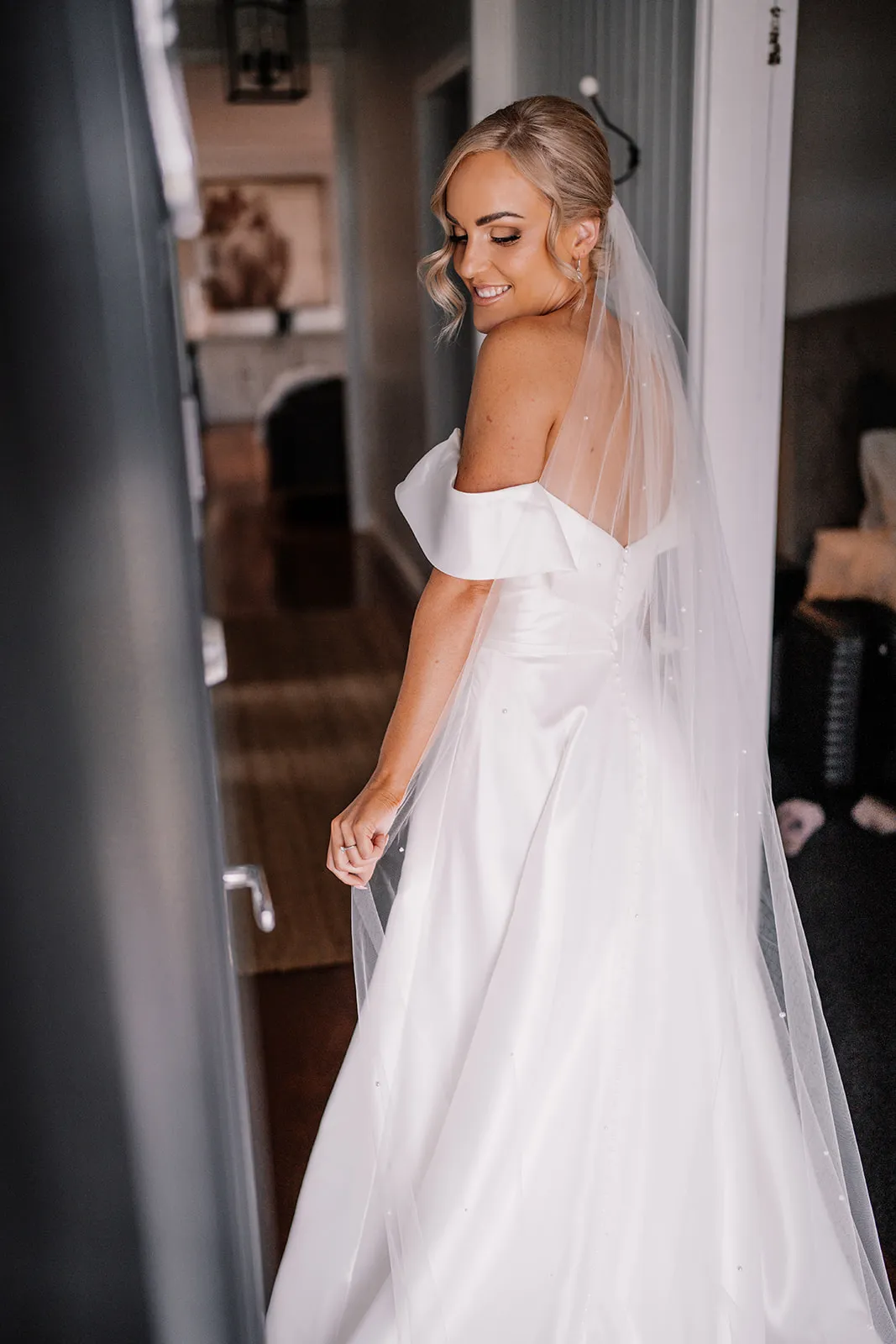 Bride standing in doorway