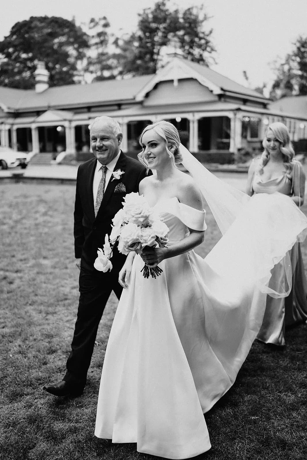 Father walking bride down the aisle