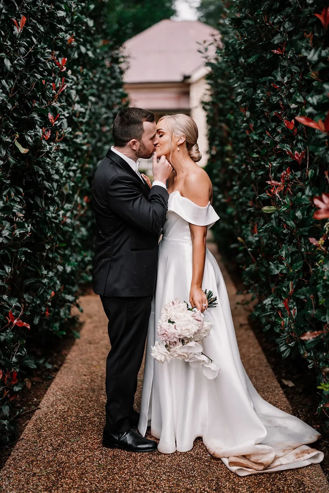 Bride and groom kissing