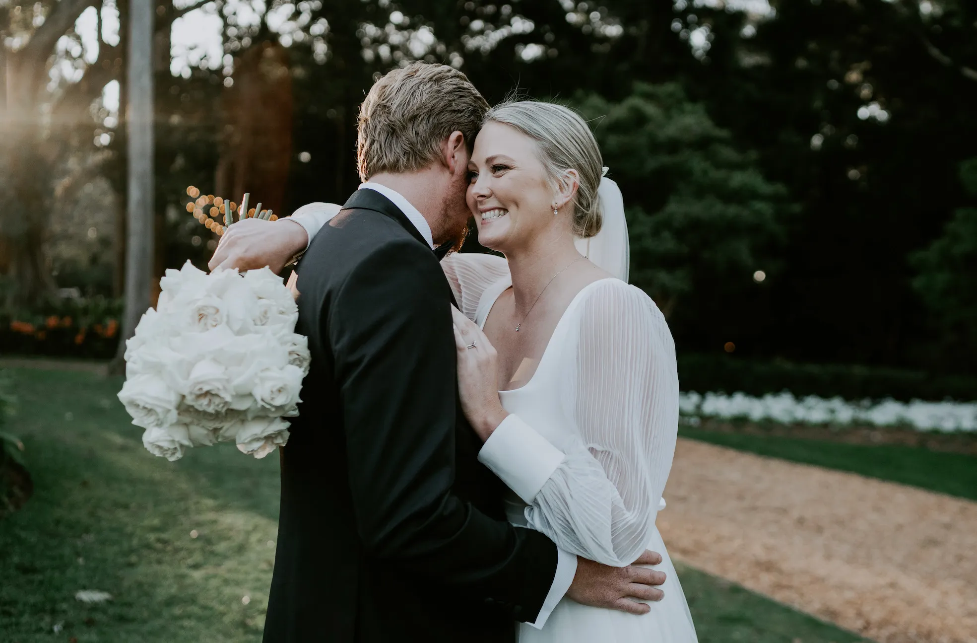 Bride and groom hugging