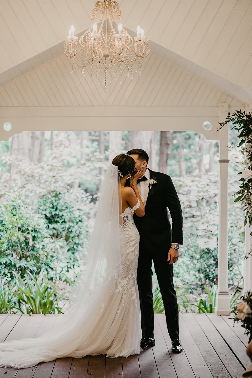 Bride and groom kissing