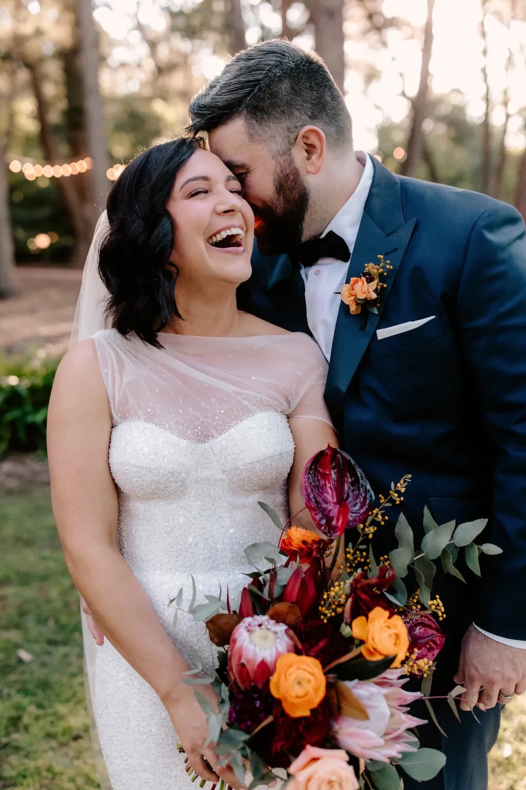 Bride and groom laughing