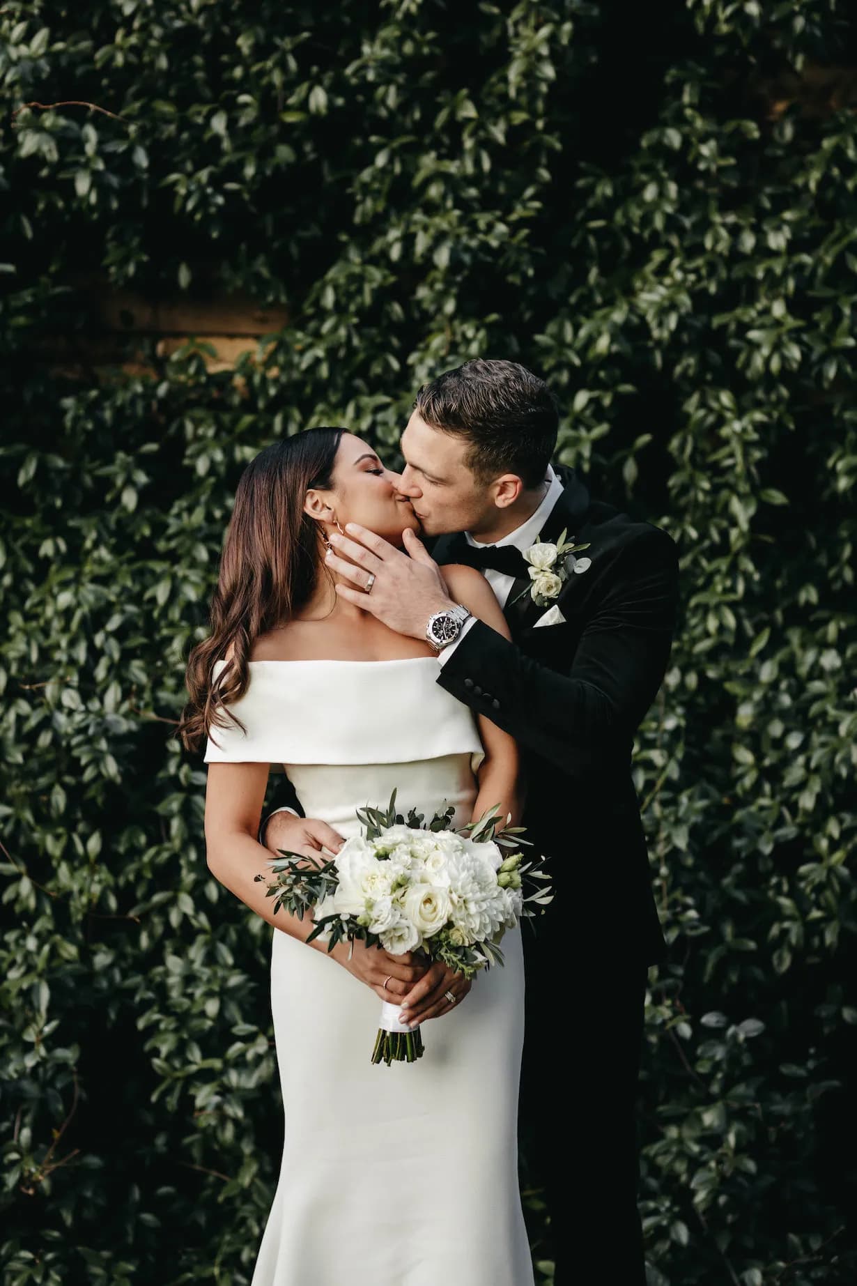 Bride and groom kissing