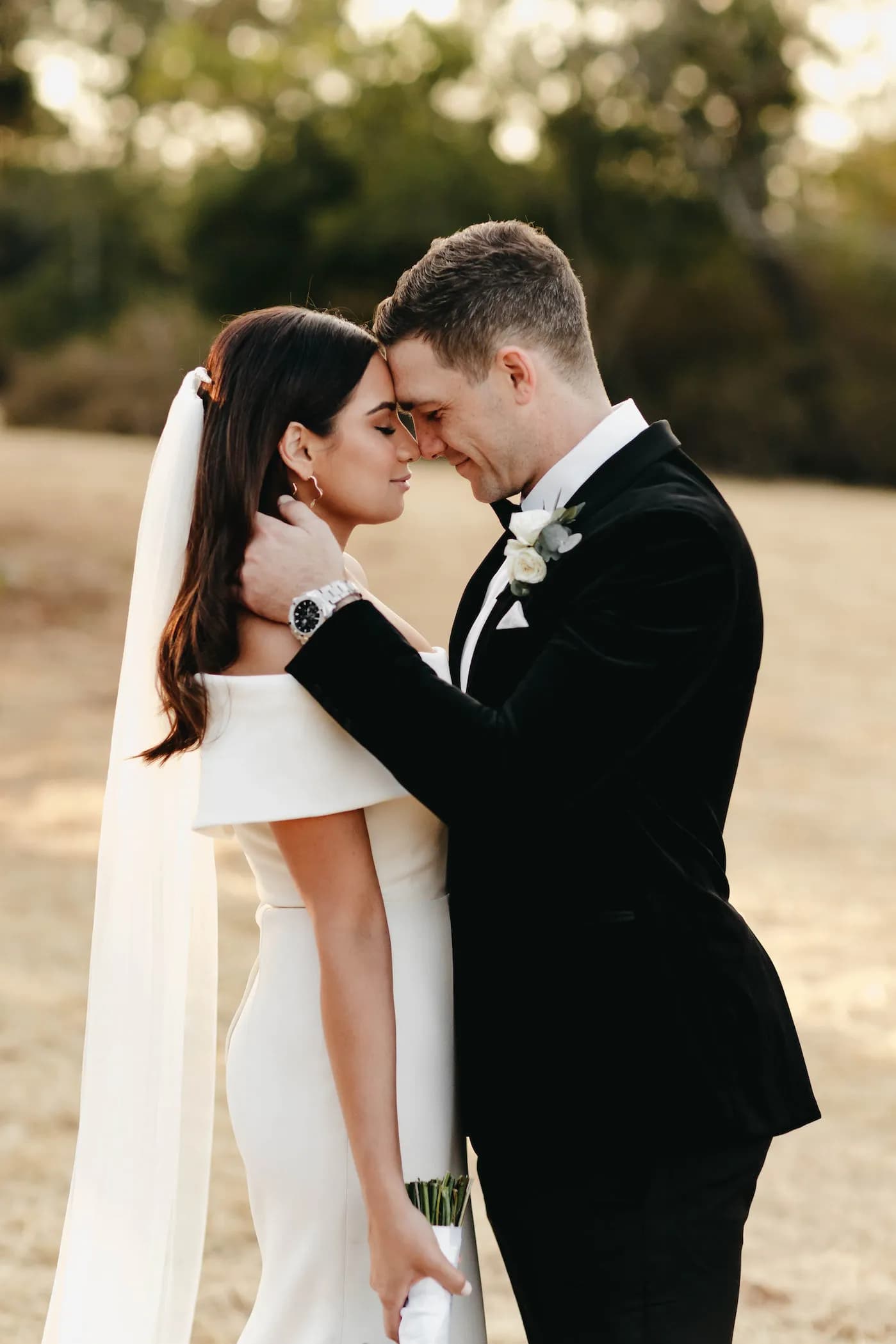 Bride and Groom holding each other