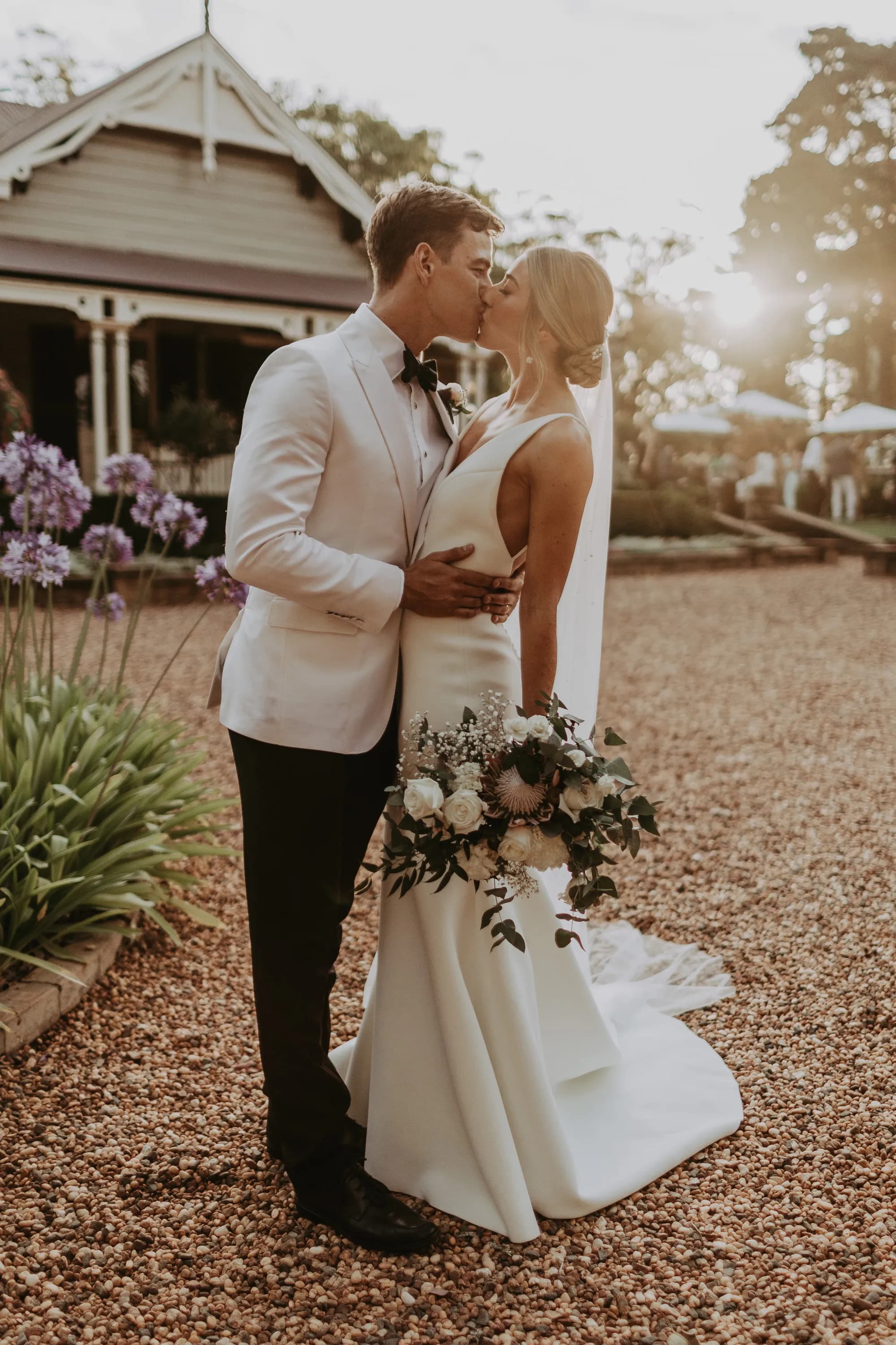 Bride and groom kissing