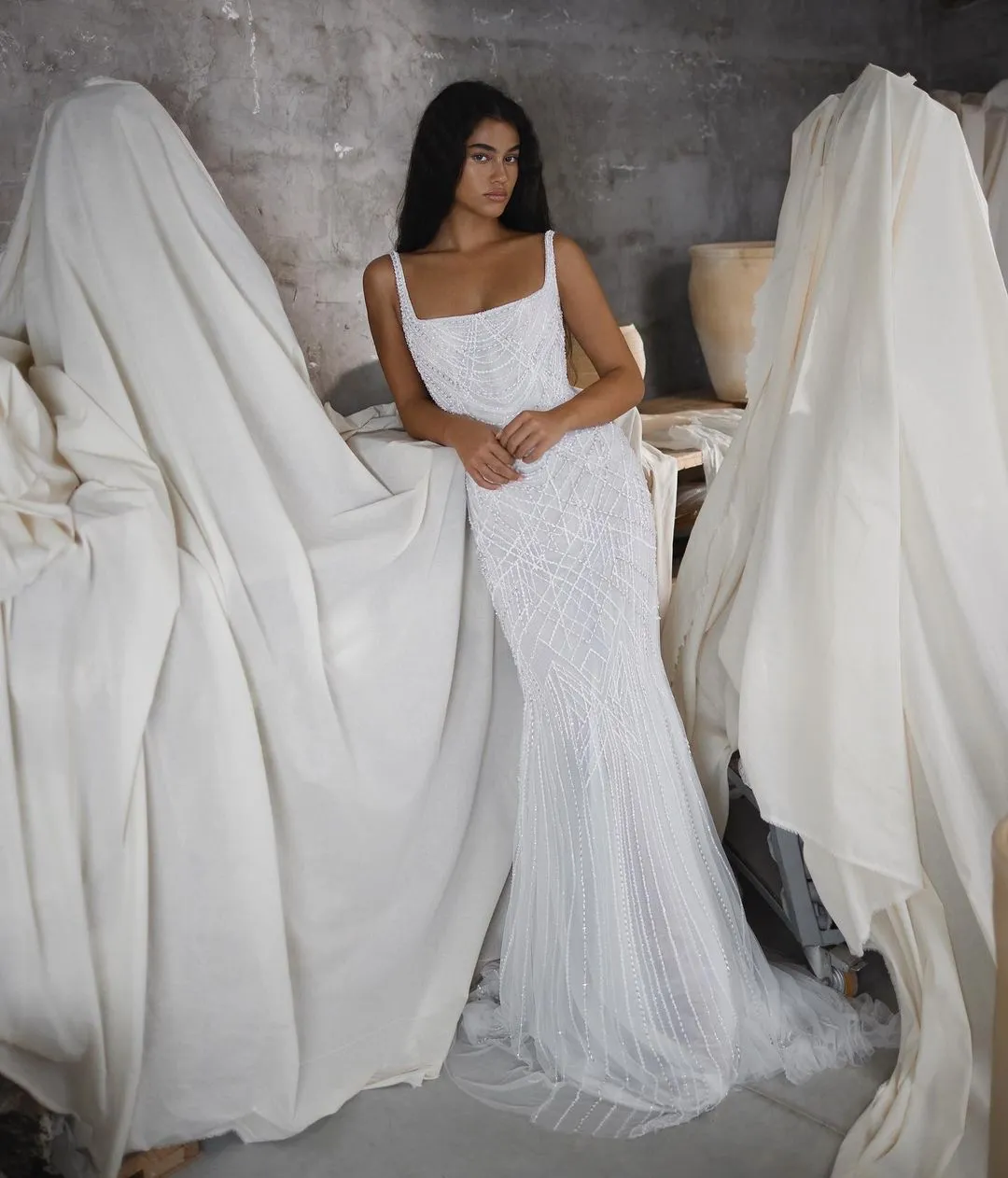 Bride wearing square neckline wedding dress