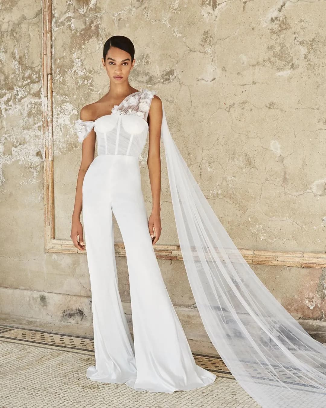 Bride wearing white jumpsuit