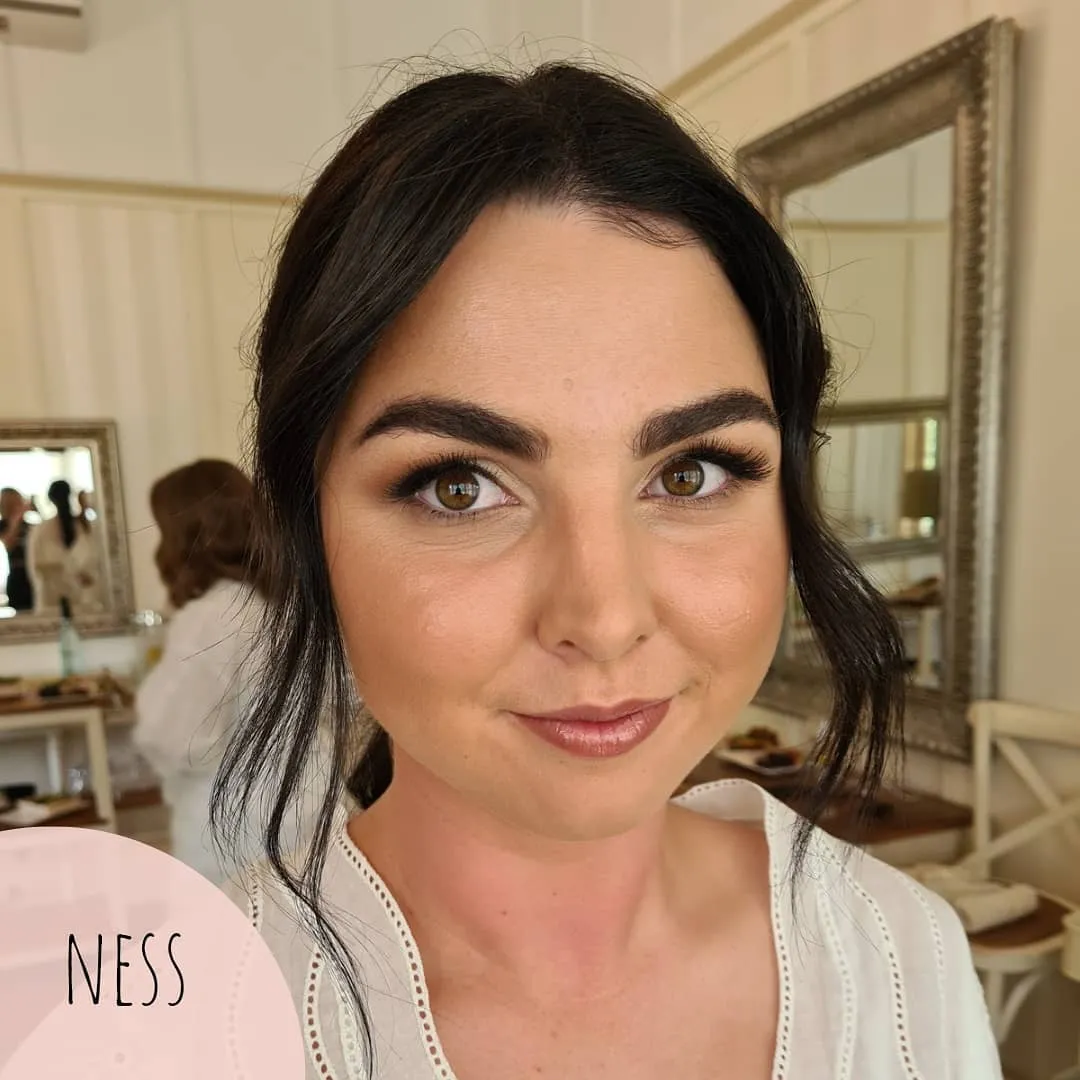 Bride getting ready with makeup on