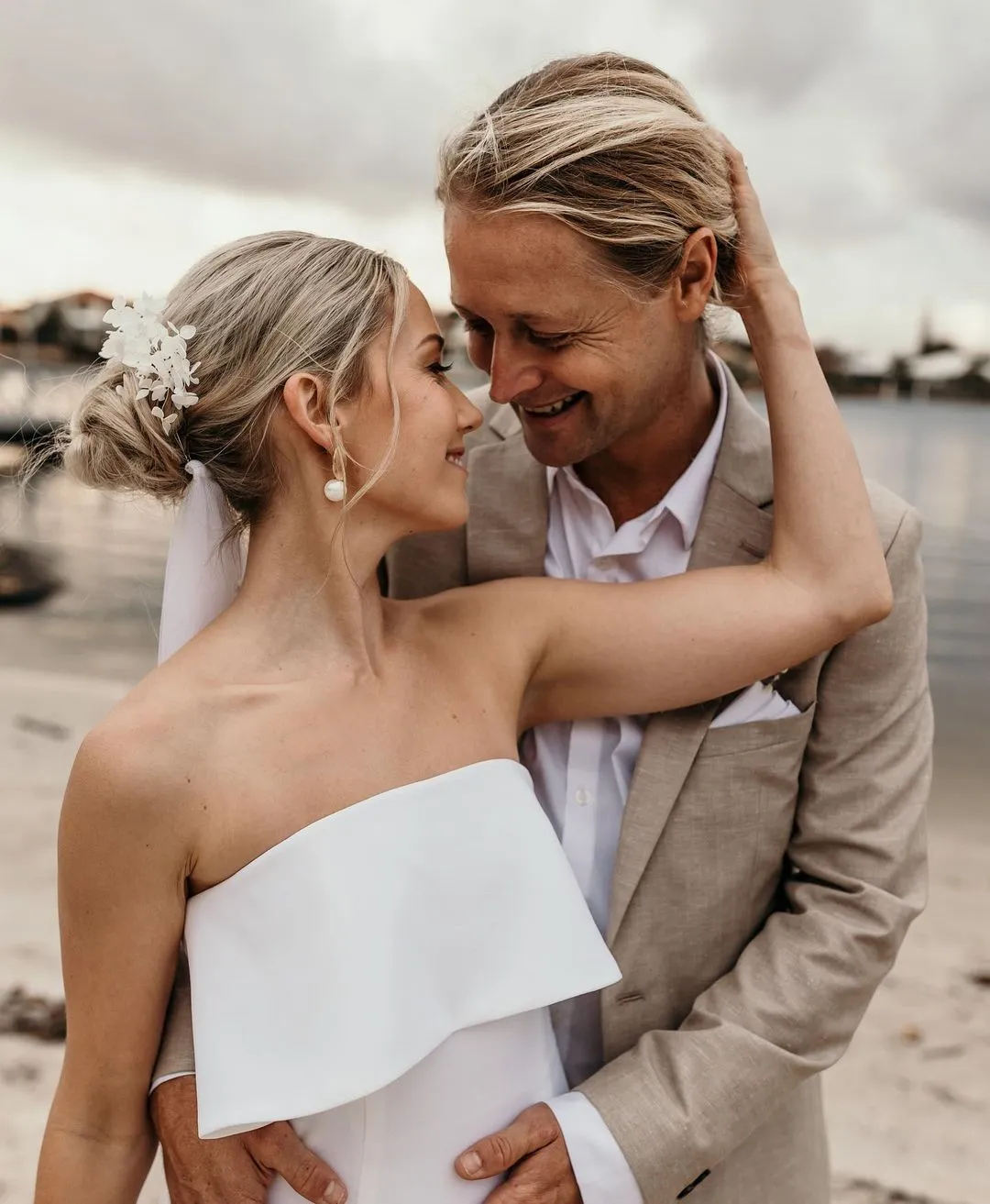 Bride and groom looking at each other