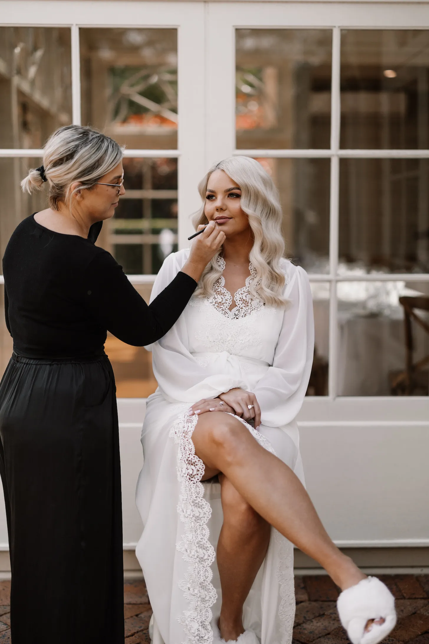 Bride getting make-up done