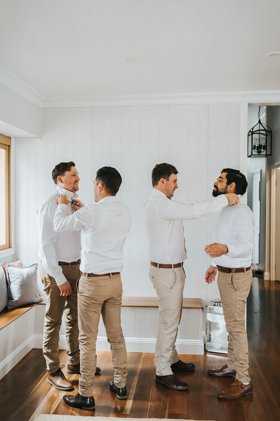 Groom and groomsment getting ready