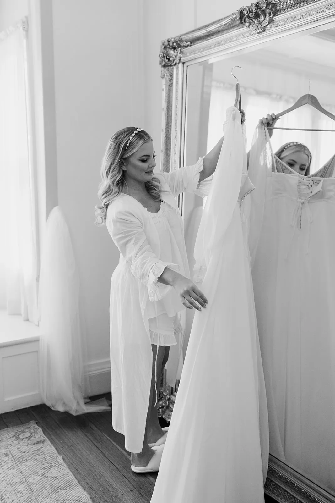 Bride looking at wedding dress