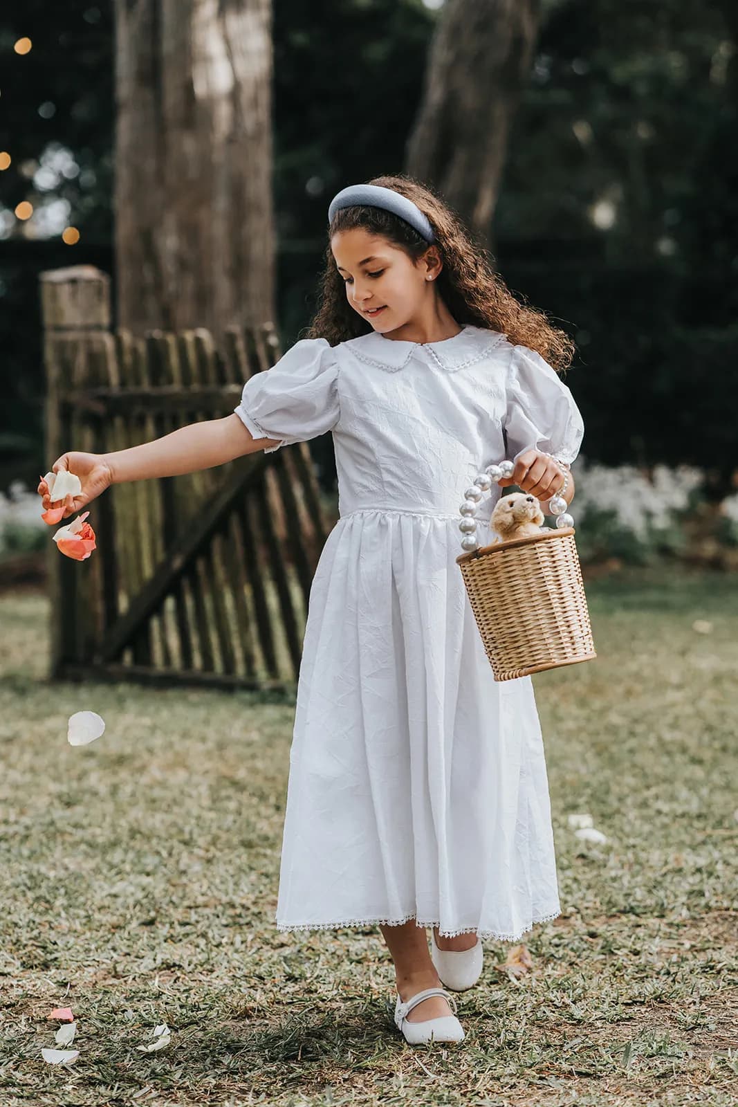 Flower girl walking down the aisle