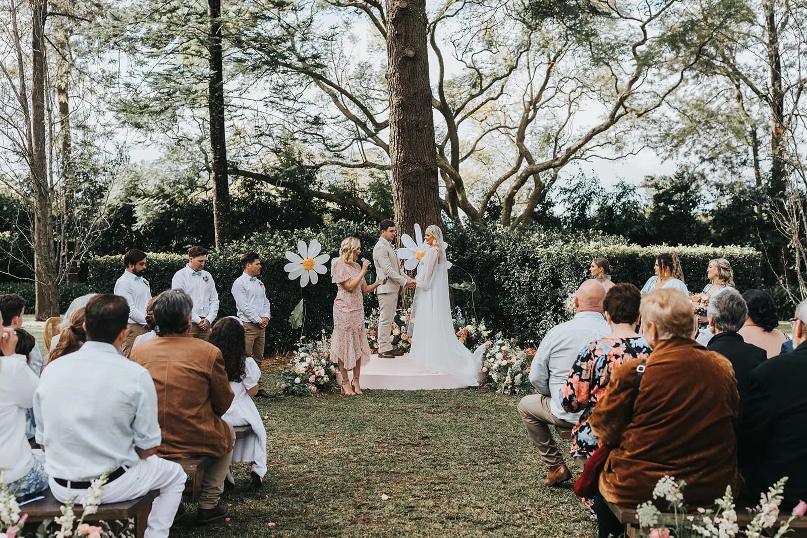 Bride and groom standing at wedding ceremony