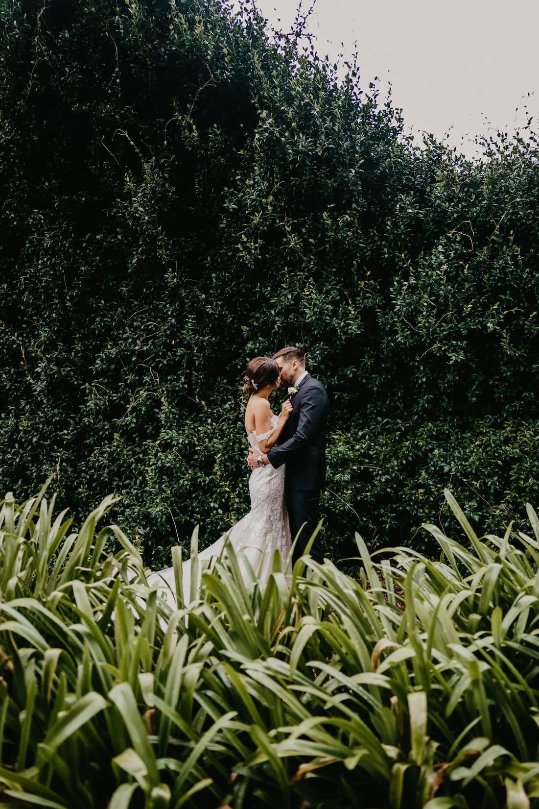 Bride and groom kissing